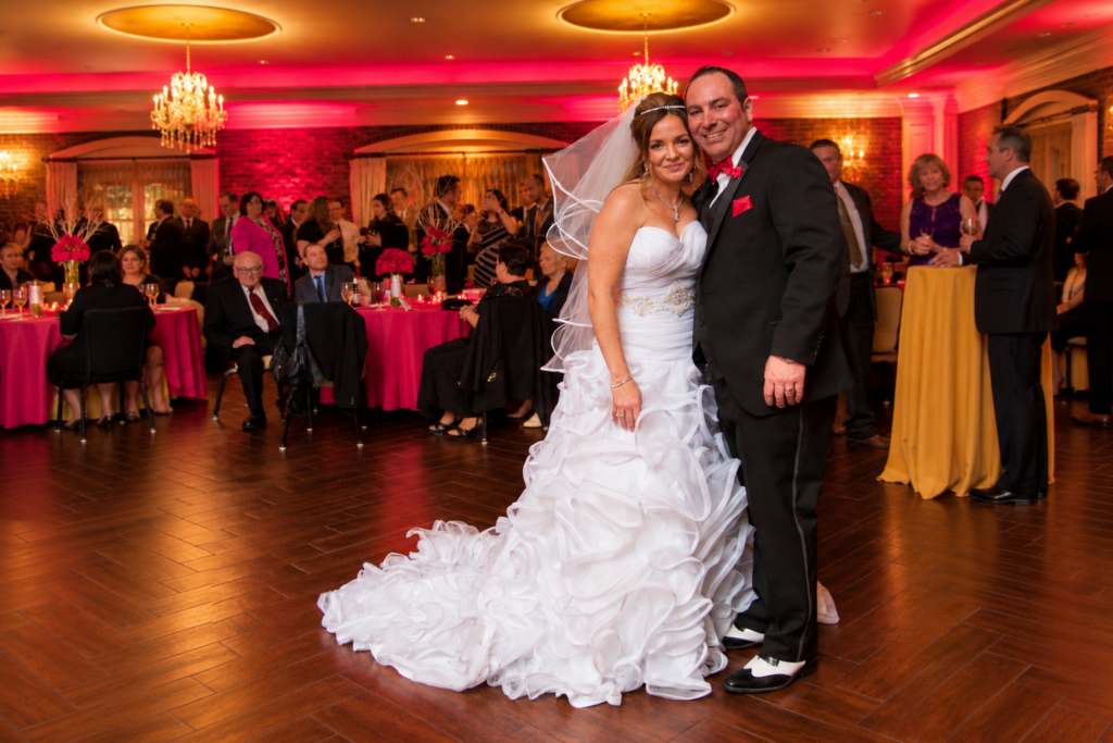 Gretchen and Chris on their wedding day in 2018, the same day they learned their future home would be theirs.